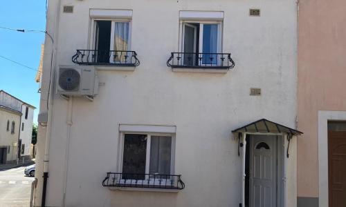 Coquette maison de ville au centre du village - V0787