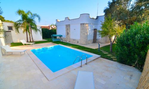 Villa Nadia con Piscina nel Boomerang Village a Torre Colimena