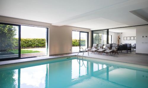 SUITE & POOL-Como House-160 mt-Private Indoor Swimming Pool, heated all year-Private Covered Parking-Private Garden and terrace-Fully equipped Kitchen