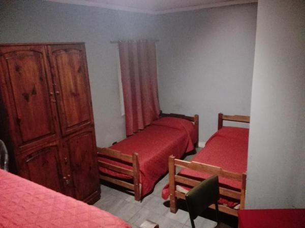 Hostal Namaste : photo 8 de la chambre chambre quadruple avec salle de bains privative séparée