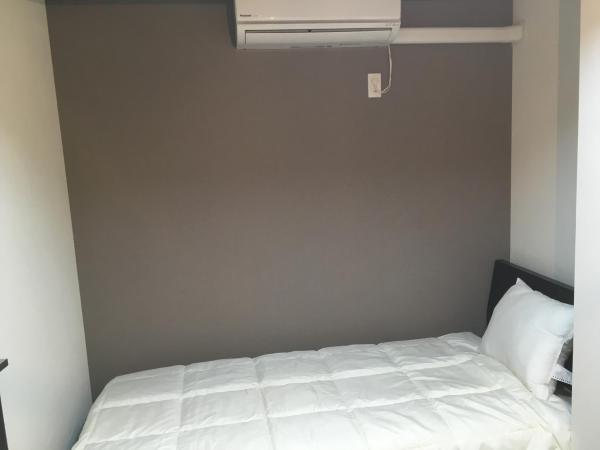 TIMES INN 2F : photo 5 de la chambre chambre lits jumeaux standard avec salle de bains commune