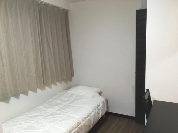 TIMES INN 2F : photo 4 de la chambre chambre lits jumeaux standard avec salle de bains commune