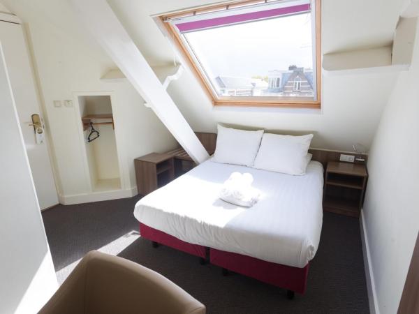 Hotel Park Plantage : photo 1 de la chambre chambre double supérieure avec baignoire