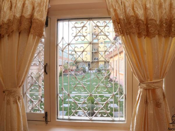 Aarya Chaitya Inn : photo 5 de la chambre chambre lits jumeaux Économique avec salle de bains commune