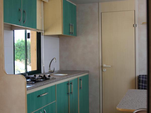 FKK Ulika - Naturist Mobile Homes Eden : photo 5 de la chambre mobile home 2 chambres avec terrasse