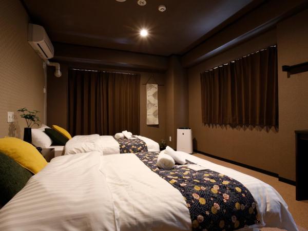 Sumiya Spa & Hotel : photo 4 de la chambre chambre lits jumeaux supérieure avec salle de bains commune