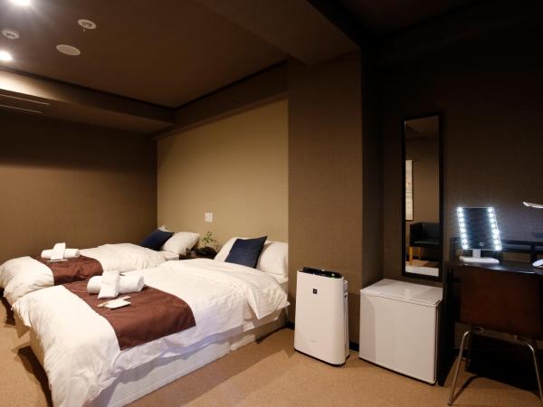 Sumiya Spa & Hotel : photo 3 de la chambre chambre lits jumeaux supérieure avec salle de bains commune