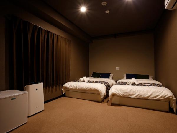 Sumiya Spa & Hotel : photo 2 de la chambre chambre lits jumeaux avec salle de bains privative