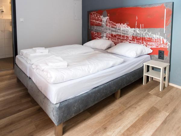 a&o Copenhagen Nørrebro : photo 1 de la chambre chambre lits jumeaux