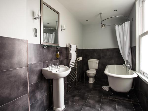 Brighton House : photo 1 de la chambre chambre double avec lit à baldaquin