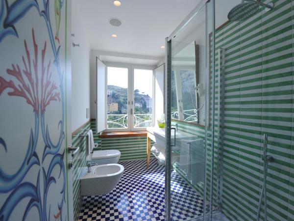 Maison Lauren : photo 1 de la chambre chambre double ou lits jumeaux deluxe - vue sur mer