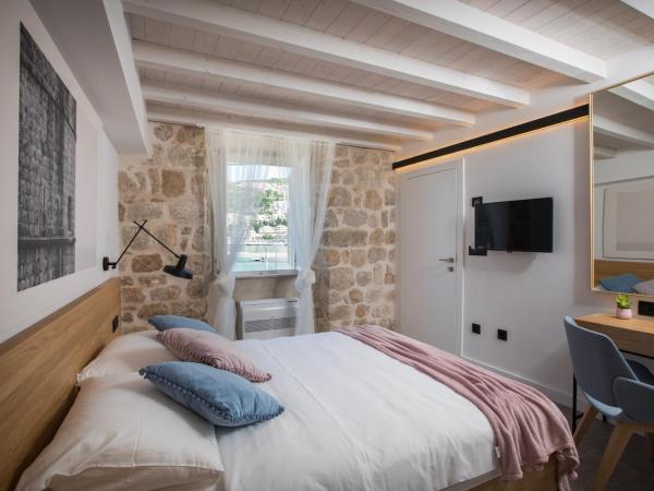 Bova Luxury Rooms : photo 1 de la chambre chambre double ou lits jumeaux deluxe - vue sur mer