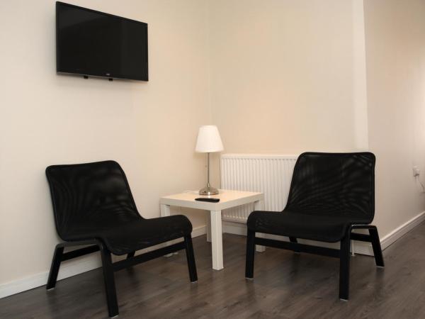 Guest House London : photo 2 de la chambre suite avec balcon et salle de bains privative