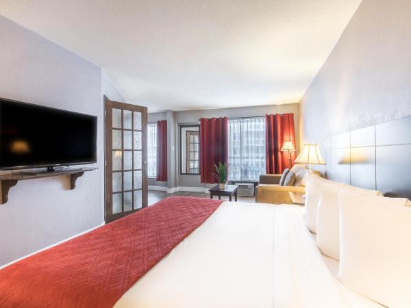 Hotel Universel : photo 2 de la chambre chambre lit king-size de luxe avec jacuzzi