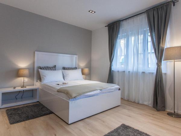 Priuli Luxury Rooms : photo 8 de la chambre chambre lit queen-size deluxe - annexe - 5 rue vukovarska