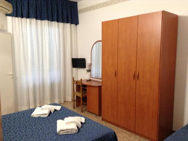 Hotel Saponi : photo 1 de la chambre chambre triple