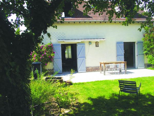 Chambre en ville dans un esprit campagne : photo 4 de la chambre chambre double avec patio