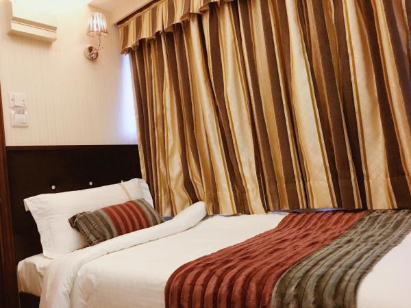 Seasons Hotel - Causeway Bay : photo 1 de la chambre chambre simple
