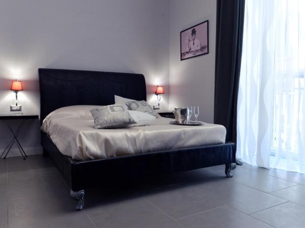 Chiaia Roof : photo 7 de la chambre suite lit king-size avec balcon