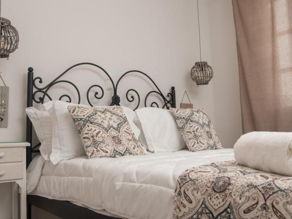 Relax Studios : photo 9 de la chambre chambre double ou lits jumeaux - vue sur jardin