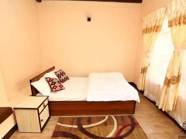 Aarya Chaitya Inn : photo 5 de la chambre chambre double Économique avec salle de bains commune