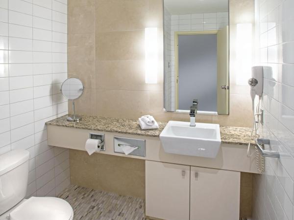 Le Square Phillips Hôtel & Suites : photo 4 de la chambre suite loft avec 2 lits queen-size