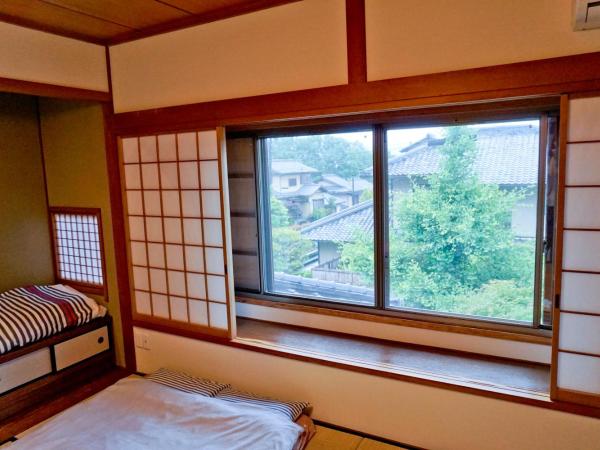 Kinkaku : photo 2 de la chambre chambre quadruple avec tatami et vue - 201
