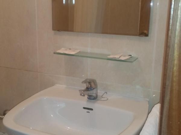 Hostal Lima : photo 6 de la chambre chambre lits jumeaux