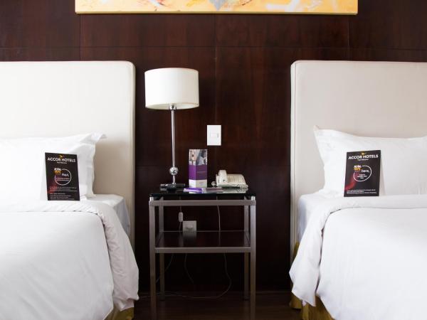 Mercure Belo Horizonte Lourdes : photo 2 de la chambre chambre lits jumeaux classique