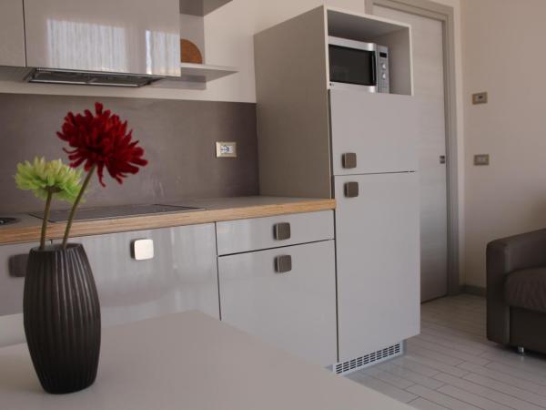 Hotel & Residence Cavalluccio Marino : photo 3 de la chambre appartement 1 chambre