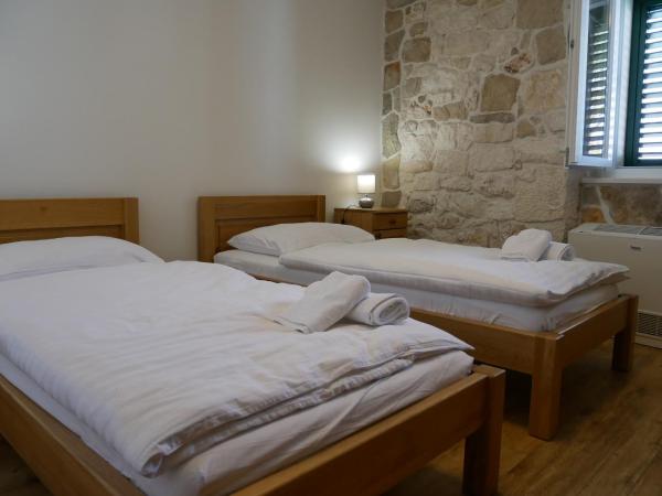 Guest house Jere Old Town : photo 2 de la chambre chambre double ou lits jumeaux deluxe - vue sur mer