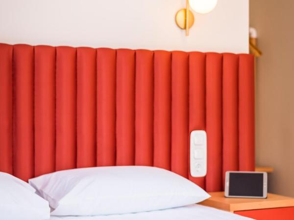 TheJoy City Suites : photo 1 de la chambre chambre double supérieure avec balcon