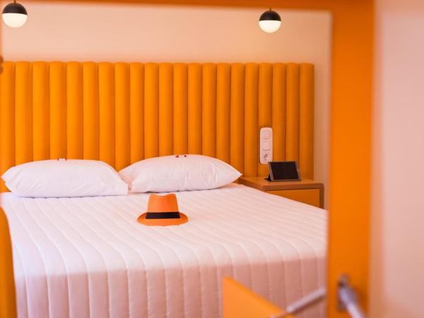 TheJoy City Suites : photo 2 de la chambre chambre double supérieure avec balcon