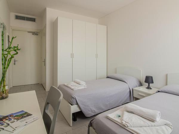 Casa Lucia Valentini Terrani : photo 1 de la chambre chambre lits jumeaux