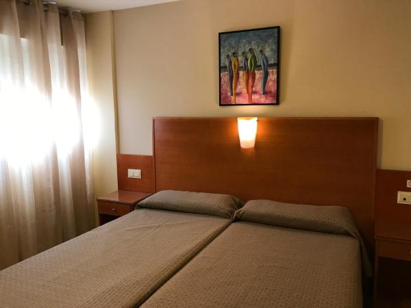 Los Galanes : photo 3 de la chambre chambre lits jumeaux