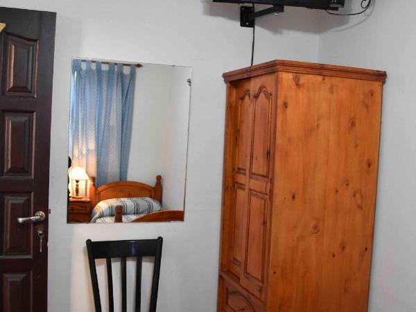 Residencial El Hogar : photo 2 de la chambre chambre lits jumeaux