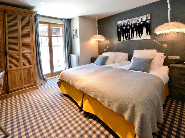 Maison de Famille Les 5 Frères : photo 2 de la chambre chambre double ou lits jumeaux avec douche ou baignoire - sud