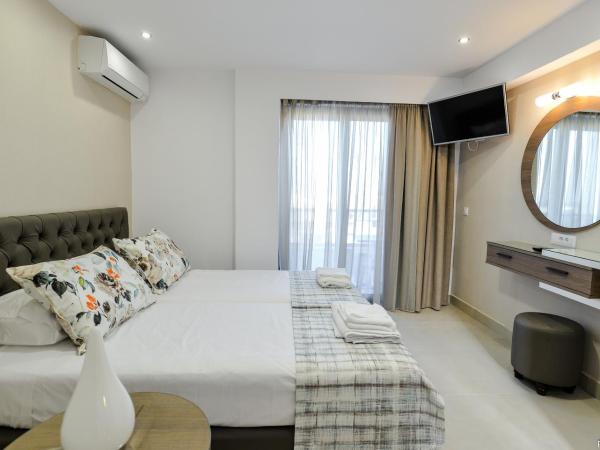 Island Dreams Rooms & Suites : photo 3 de la chambre chambre double ou lits jumeaux exécutive