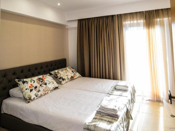 Island Dreams Rooms & Suites : photo 6 de la chambre chambre double ou lits jumeaux exécutive