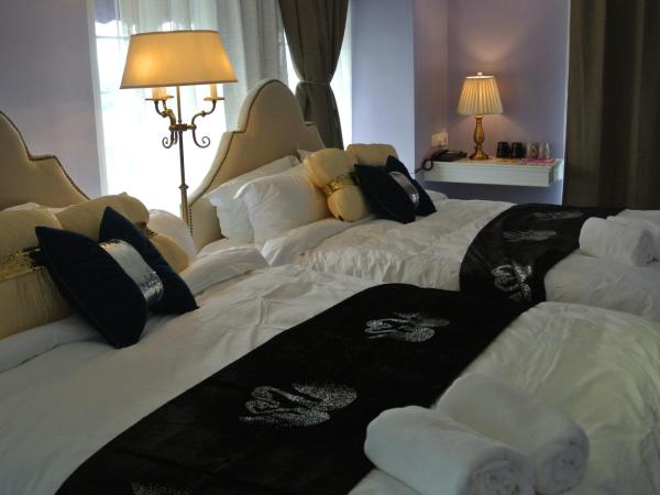 1 Day Car Hotel Station 18 : photo 4 de la chambre chambre quadruple classique