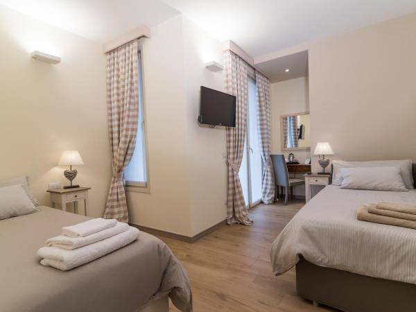 Relais Dei Mandorli : photo 10 de la chambre chambre lits jumeaux avec salle de bains privative séparée