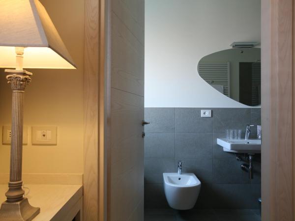 Nuova Opera Rooms : photo 2 de la chambre chambre triple avec balcon