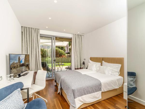 Rooms Oasis Life : photo 2 de la chambre chambre lits jumeaux deluxe avec terrasse