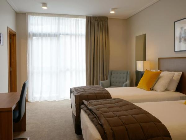 The Victoria Hotel Dunedin : photo 3 de la chambre chambre lits jumeaux supérieure