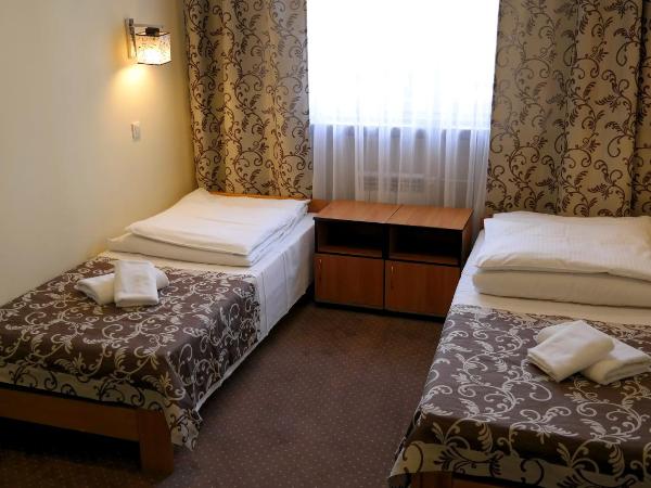 Ośrodek SCSK Optima : photo 3 de la chambre chambre lits jumeaux