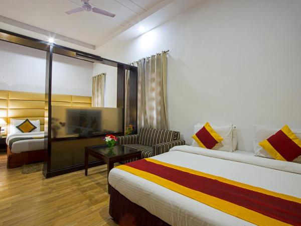 Hotel Krishna - By RCG Hotels : photo 7 de la chambre chambre familiale