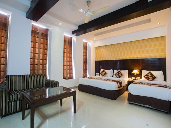 Hotel Krishna - By RCG Hotels : photo 5 de la chambre chambre triple premium