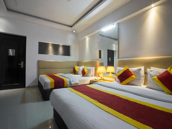 Hotel Krishna - By RCG Hotels : photo 3 de la chambre chambre familiale