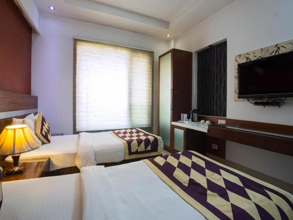 Hotel Krishna - By RCG Hotels : photo 2 de la chambre chambre deluxe double ou lits jumeaux