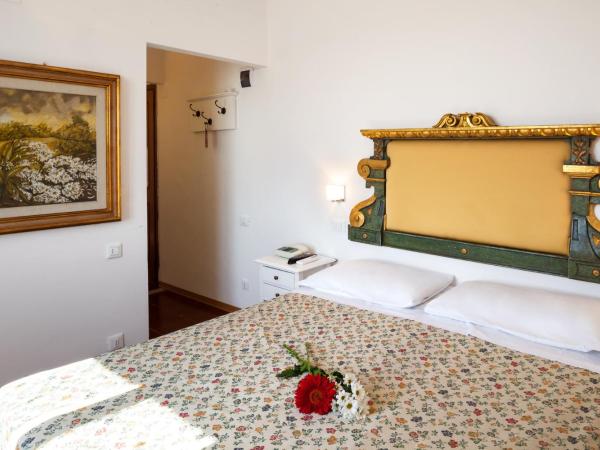 Hotel Porta Romana di Luce Hotels : photo 1 de la chambre suite - vue sur montagne